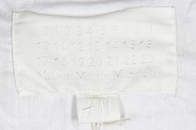 Lot 96 - A men's Maison Margiela for H&M leather jacket formed from belts, 2012