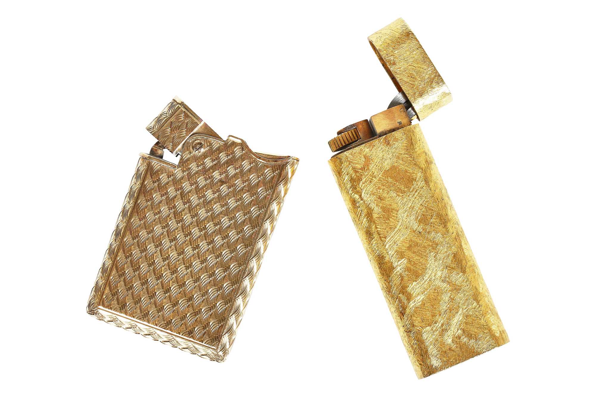 Lot 32 - A Cartier brushed-gold plated lighter, 20th century