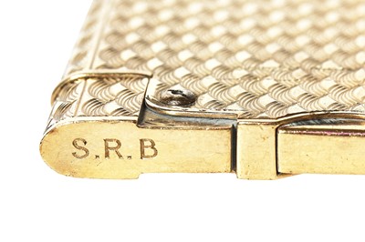 Lot 32 - A Cartier brushed-gold plated lighter, 20th century