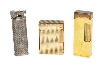 Lot 32 - A Cartier brushed-gold plated lighter, 20th century