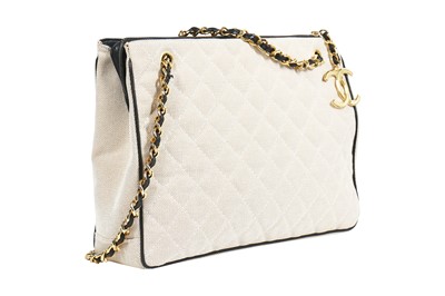Lot 1 - A Chanel quilted canvas and navy lambskin leather bag, Spring-Summer 1991 ready-to-wear