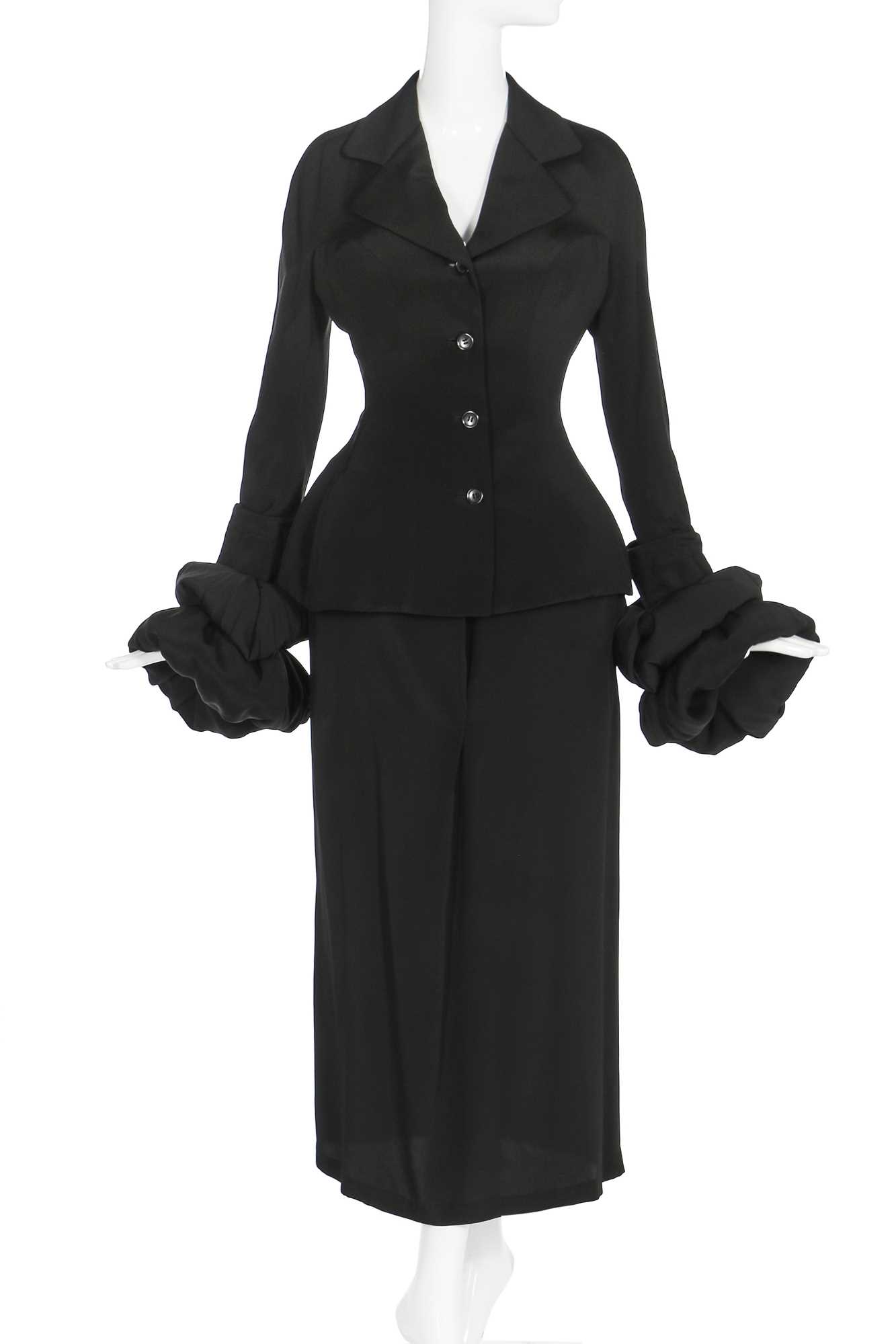 Lot 189 - A Yohji Yamamoto black silk suit with padded cuffs, 1990s