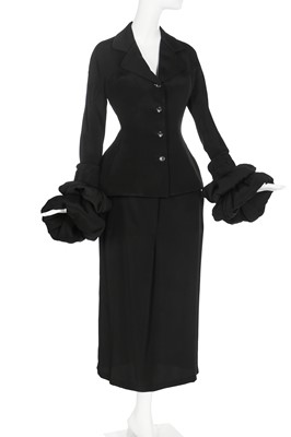 Lot 189 - A Yohji Yamamoto black silk suit with padded cuffs, 1990s