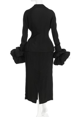 Lot 189 - A Yohji Yamamoto black silk suit with padded cuffs, 1990s
