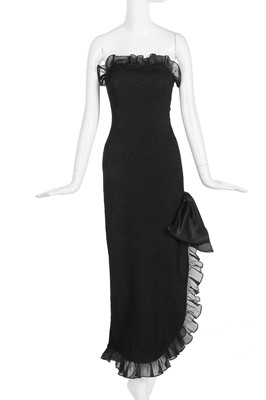 Lot 146 - An Yves Saint Laurent black silk cloqué evening gown, Autumn-Winter 1987-88