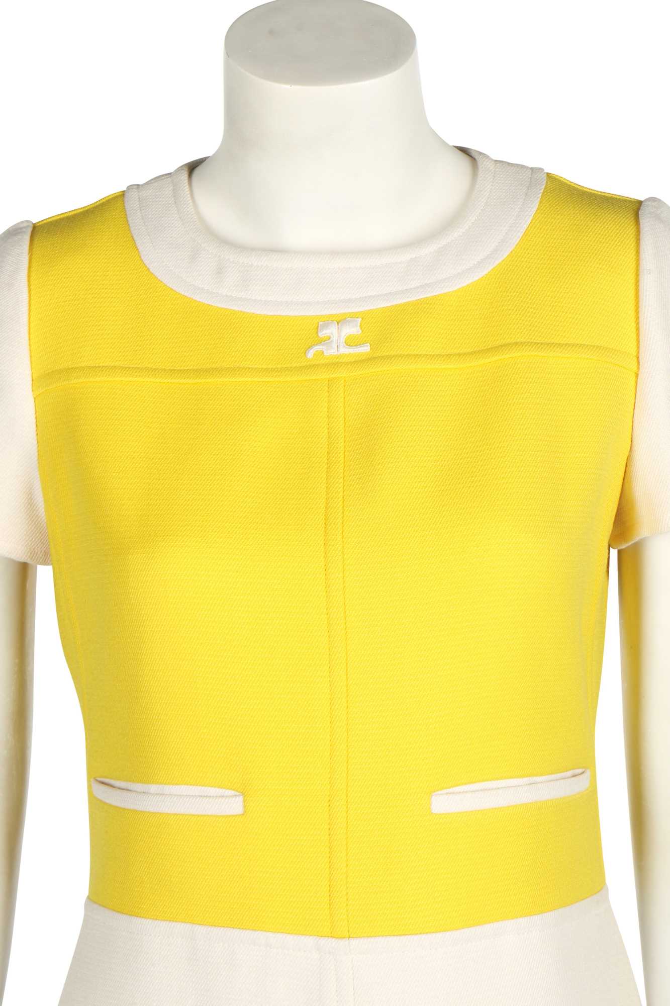 Lot 143 - A Courrèges yellow and white wool dress, early 1970s