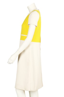 Lot 143 - A Courrèges yellow and white wool dress, early 1970s