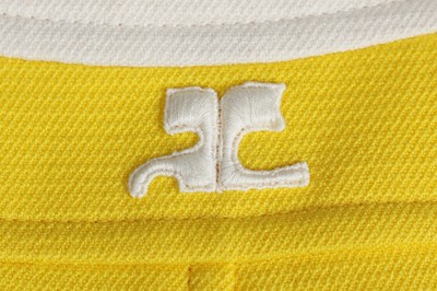Lot 143 - A Courrèges yellow and white wool dress, early 1970s