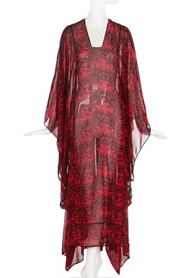 Lot 135 - A Thea Porter chiffon abaya printed with calligraphic beasts, 1970s