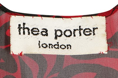 Lot 135 - A Thea Porter chiffon abaya printed with calligraphic beasts, 1970s