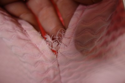 Lot 100 - A Courrèges pale-pink cotton matelassé playsuit, late 1960s