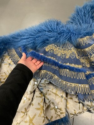 Lot 151 - A rare Zandra Rhodes reversible suede and Mongolian-lamb-fur cape, 'Egyptian' collection, 1987