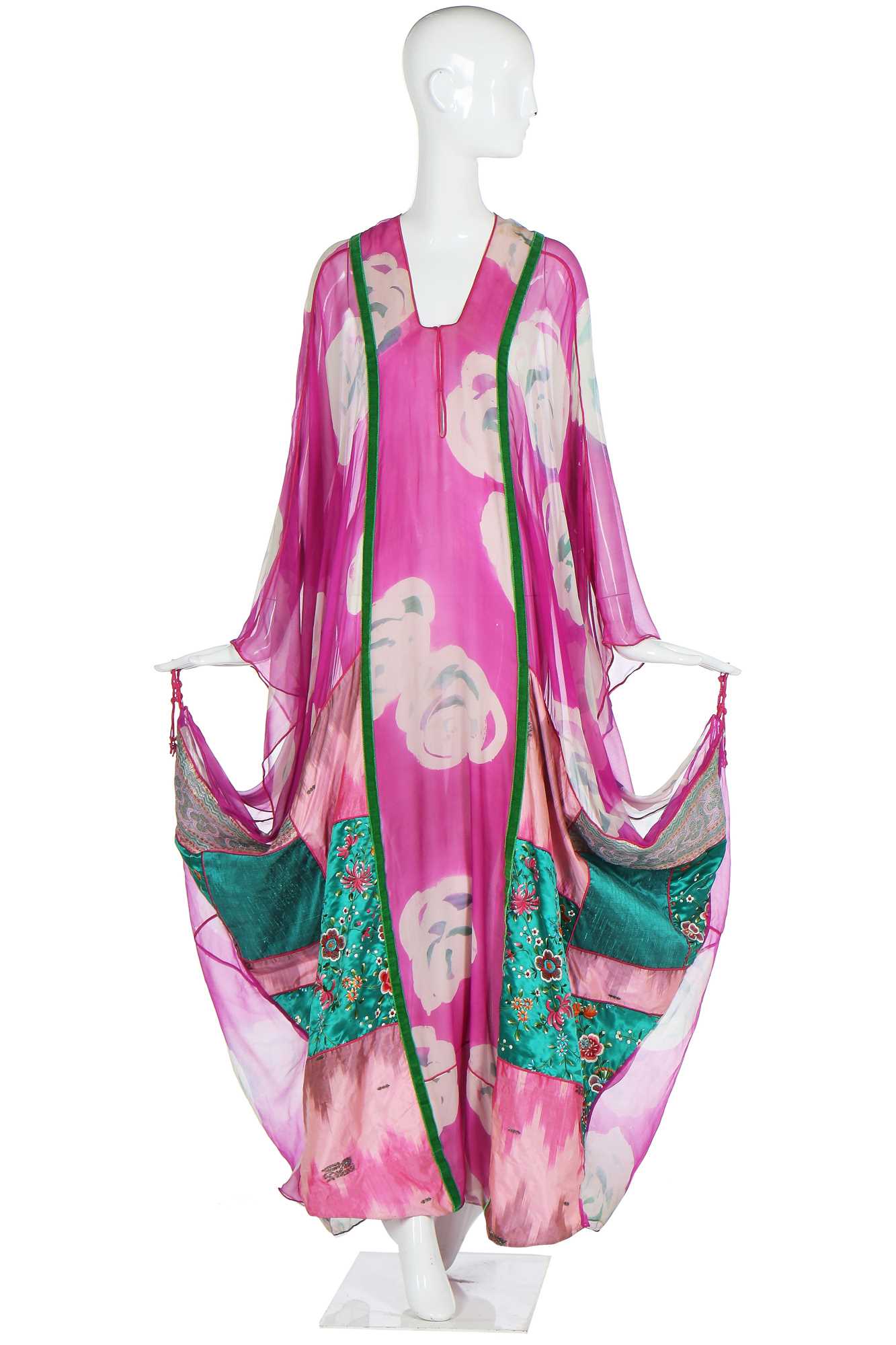 Lot 138 - A Thea Porter abaya/kaftan of magenta floral-printed chiffon, 1970s