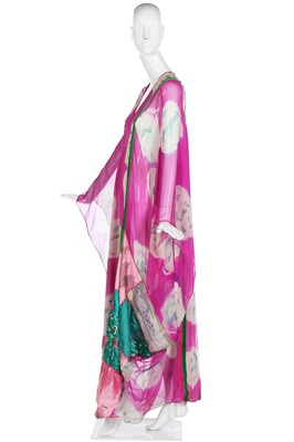 Lot 138 - A Thea Porter abaya/kaftan of magenta floral-printed chiffon, 1970s