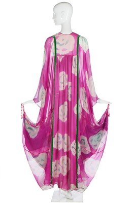 Lot 138 - A Thea Porter abaya/kaftan of magenta floral-printed chiffon, 1970s