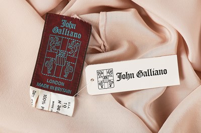 Lot 173 - A John Galliano pale-pink silk dress, late 1980s