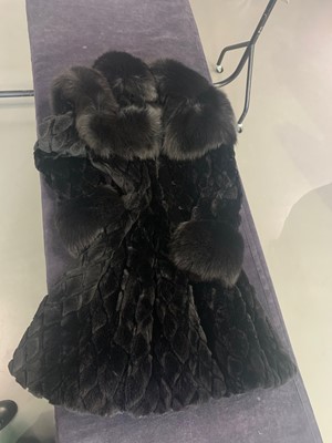 Lot 104 - Alexander McQueen by Sarah Burton trimmed fur and fox fur coat, circa 2014