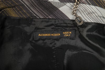 Lot 411 - An Alexander McQueen woven striped frock coat, Eshu collection, Autumn-Winter 2000