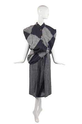 Lot 342 - An Issey Miyake cotton ensemble in shades of blue-black and grey, circa 1985