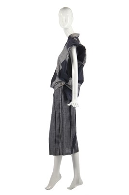 Lot 342 - An Issey Miyake cotton ensemble in shades of blue-black and grey, circa 1985