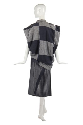 Lot 342 - An Issey Miyake cotton ensemble in shades of blue-black and grey, circa 1985