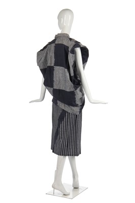 Lot 342 - An Issey Miyake cotton ensemble in shades of blue-black and grey, circa 1985