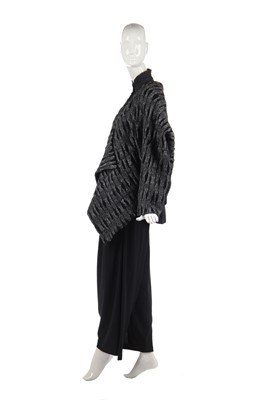 Lot 344 - An Issey Miyake textured wool jacket in shades of blue-grey and black, circa 1983
