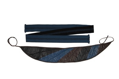 Lot 344 - An Issey Miyake textured wool jacket in shades of blue-grey and black, circa 1983