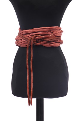 Lot 188 - An Issey Miyake two-piece ensemble in shades of brick-orange and black, circa 1977