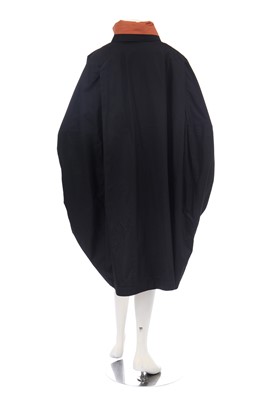 Lot 188 - An Issey Miyake two-piece ensemble in shades of brick-orange and black, circa 1977