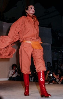 Lot 188 - An Issey Miyake two-piece ensemble in shades of brick-orange and black, circa 1977