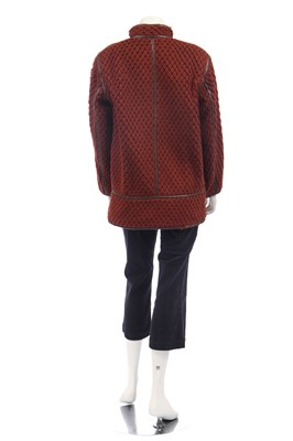 Lot 188 - An Issey Miyake two-piece ensemble in shades of brick-orange and black, circa 1977