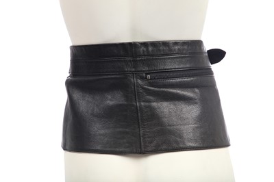 Lot 184 - An Issey Miyake black nylon convertible duffle bag/backpack, probably 1990s