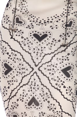 Lot 144 - A John Galliano heart-printed chiffon bias-cut evening gown with hood, probably pre-collection 2001-02