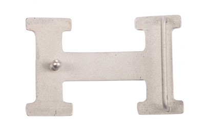 Lot 56 - An Hermès black leather belt with metal 'lock' clasp, modern