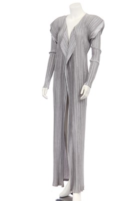 Lot 183 - An Issey Miyake pleated silver polyester full-length coat, probably 1990s