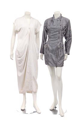 Lot 191 - A pair of Jean Paul Gaultier jeans printed with 'fight racism' and peace symbols, 2000s