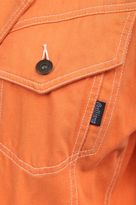 Lot 191 - A pair of Jean Paul Gaultier jeans printed with 'fight racism' and peace symbols, 2000s