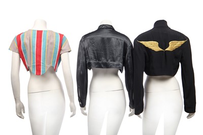 Lot 191 - A pair of Jean Paul Gaultier jeans printed with 'fight racism' and peace symbols, 2000s