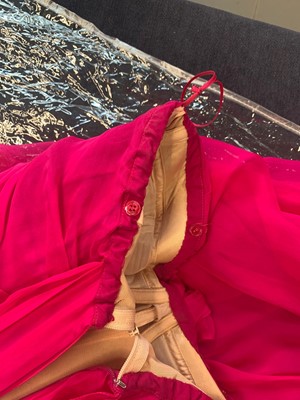 Lot 113 - An Alexander McQueen raspberry-pink silk chiffon evening gown, circa 2008