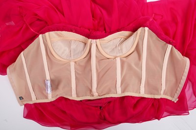Lot 113 - An Alexander McQueen raspberry-pink silk chiffon evening gown, circa 2008