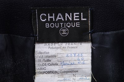 Lot 28 - A Chanel navy moss crêpe suit, 1980s