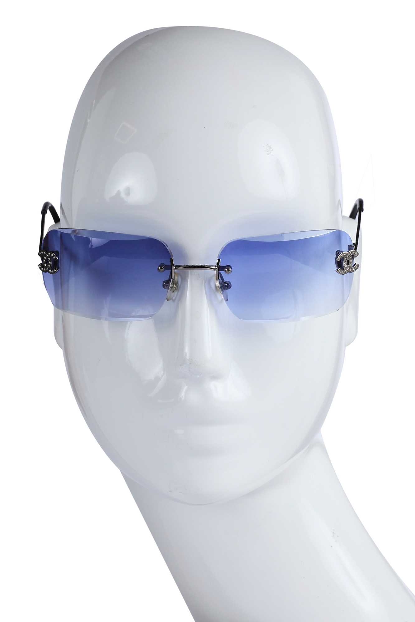 Lot 30 - Two pairs of Chanel sunglasses, 2000s