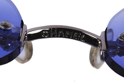 Lot 30 - Two pairs of Chanel sunglasses, 2000s