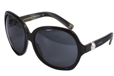 Lot 30 - Two pairs of Chanel sunglasses, 2000s