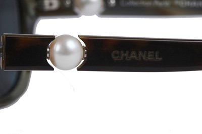 Lot 30 - Two pairs of Chanel sunglasses, 2000s