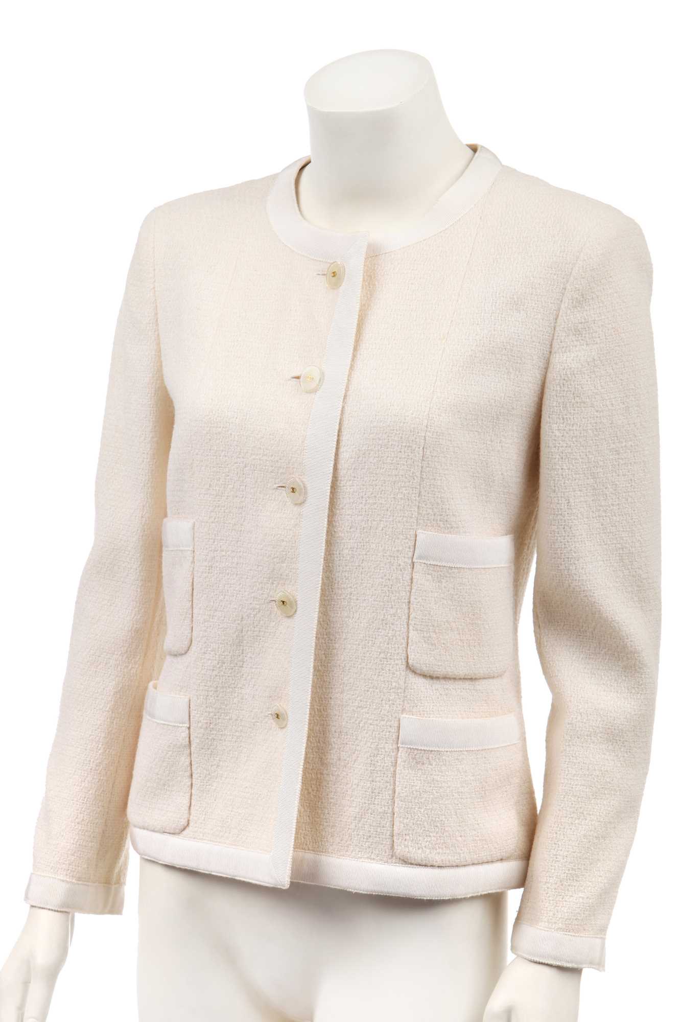 Lot 15 - A Chanel cream tweed jacket Spring/Summer 2002