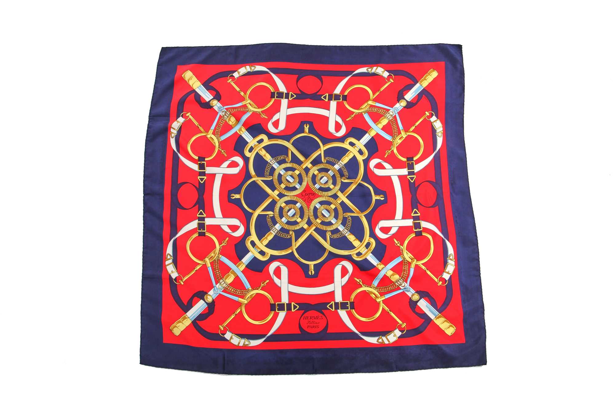 Lot 49 - Three Hermès printed silk scarves, various dates
