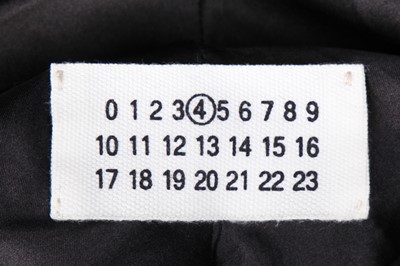 Lot 88 - A group of Martin Margiela clothing in mainly black and neutral shades, 2008