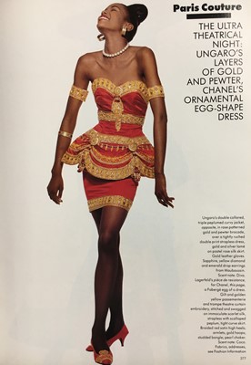 Lot 25 - A red satin cocktail dress in the style of Chanel, probably late 1980s